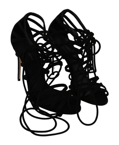 Black suede strap stilettos sandals by Dolce & Gabbana with high heels and elegant design.