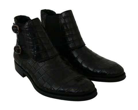 Black crocodile leather Derby boots by Dolce & Gabbana, featuring a sleek design and polished finish.