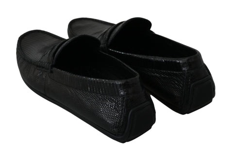 Black lizard leather flat loafers shoes by Dolce & Gabbana with sleek design and pointed toes, perfect for stylish everyday wear.