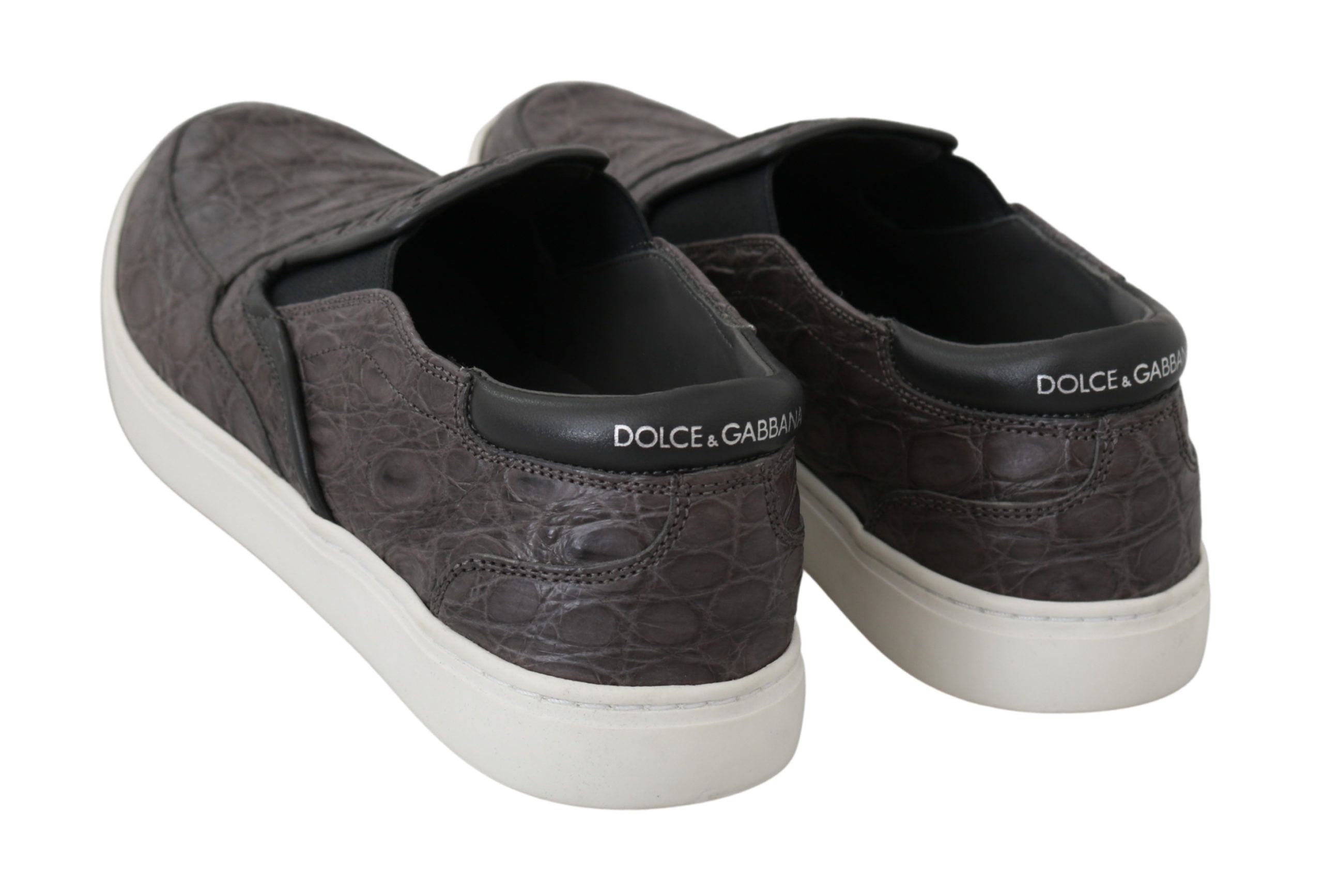 Gray leather Caiman men's loafers by Dolce & Gabbana, featuring sleek flat design and classic slip-on style.