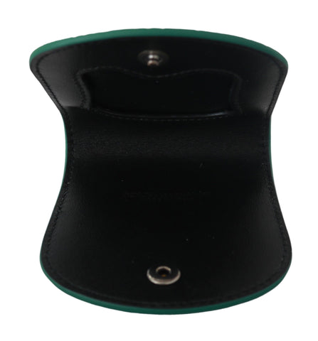 Green exotic skins condom case holder wallet by Dolce & Gabbana with textured leather exterior and compact design.