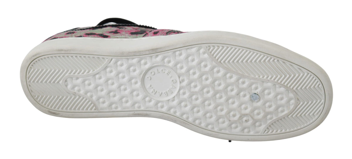 Pink leopard print leather flat sneakers by Dolce & Gabbana with lace-up design and casual style.