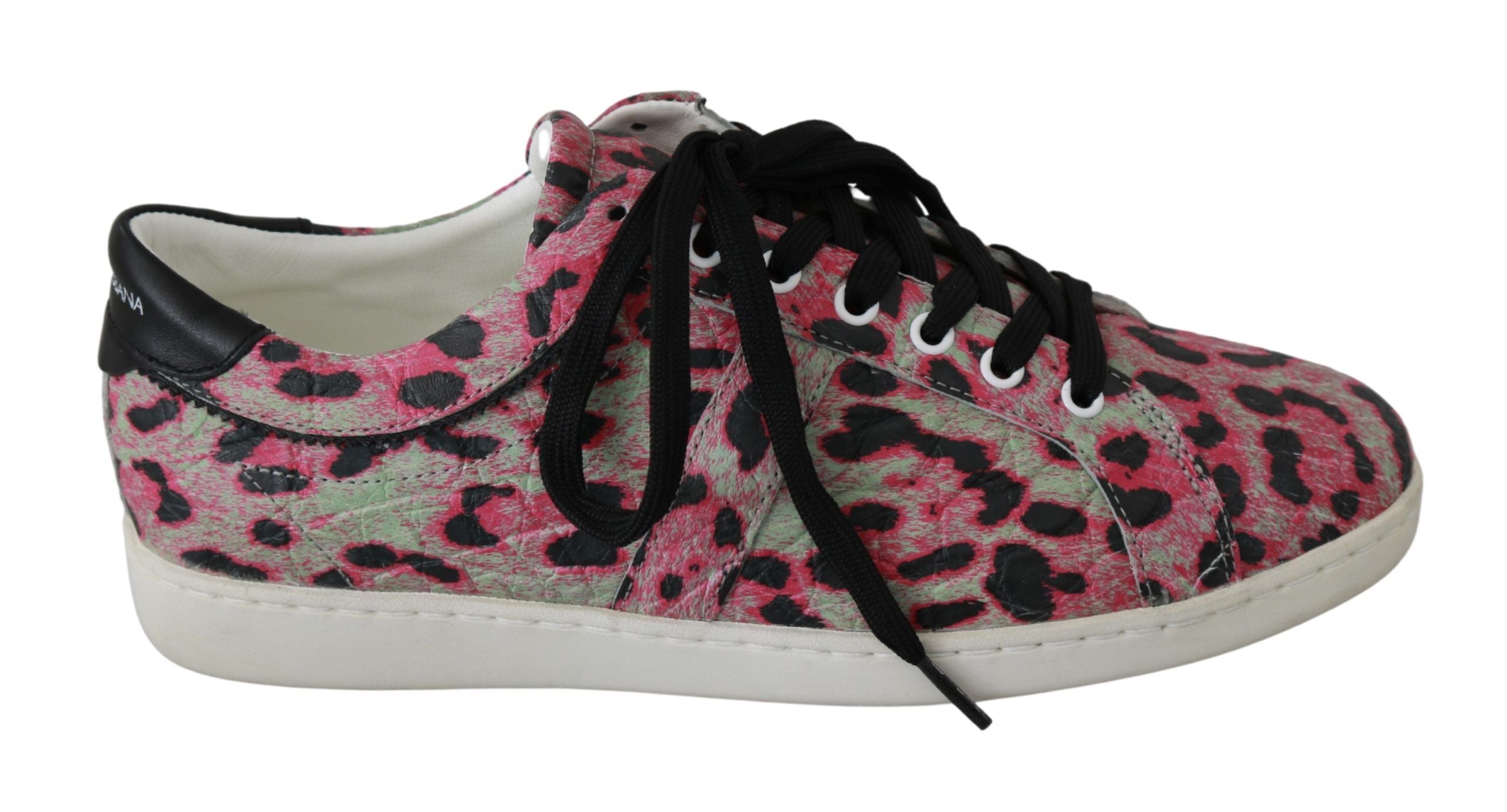 Pink leopard print leather flat sneakers by Dolce & Gabbana with lace-up design and leopard pattern detailing.