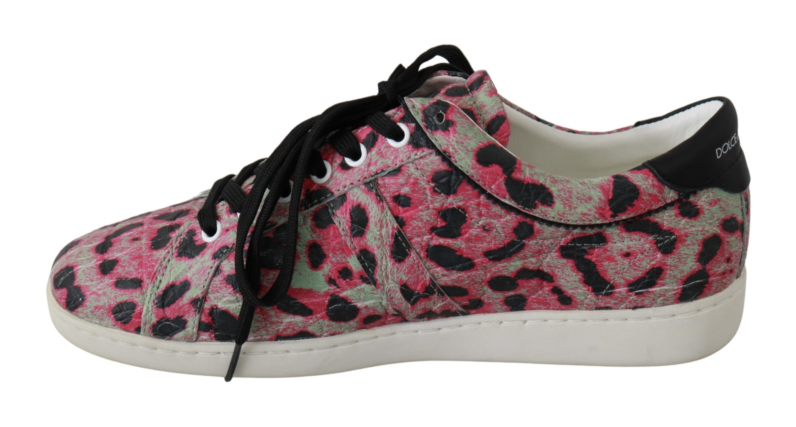 Pink leopard print leather flat sneakers by Dolce & Gabbana with sporty lace-up design and bold animal print pattern.