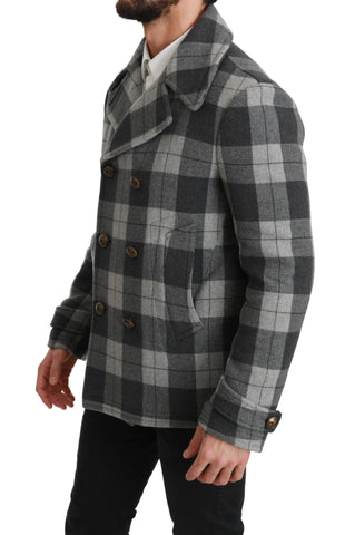 Gray check wool and cashmere coat jacket by Dolce & Gabbana, shown hanging with classic tailored design and textured fabric.