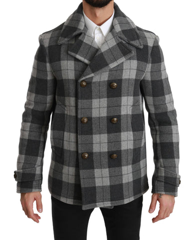 Gray check wool cashmere coat jacket by Dolce & Gabbana hanging on a clothing rack. Stylish and warm outerwear.