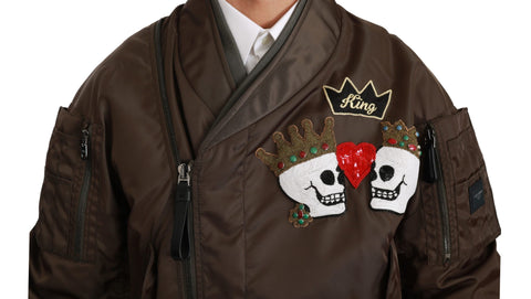 Brown beaded crown skull logo jacket by Dolce & Gabbana, featuring intricate beaded details and a stylish design.