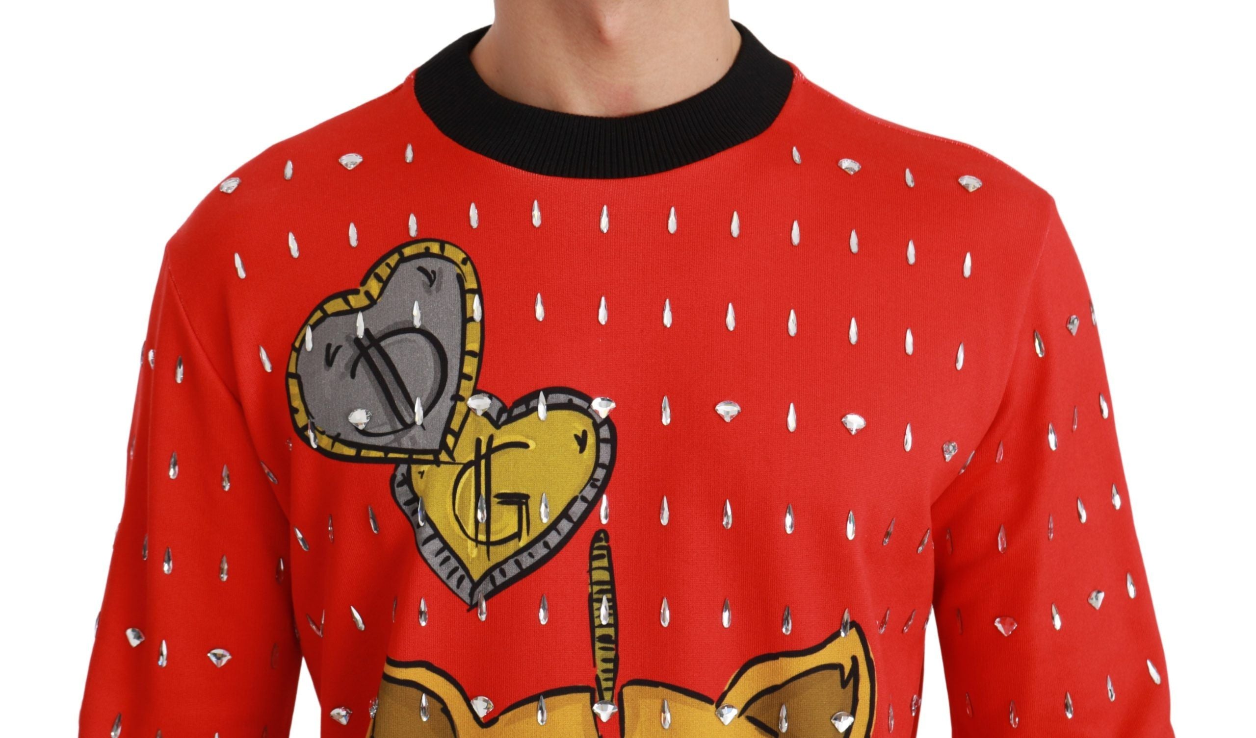Red crystal embellished pig sweater by Dolce & Gabbana featuring a playful pig design with sparkling crystals.