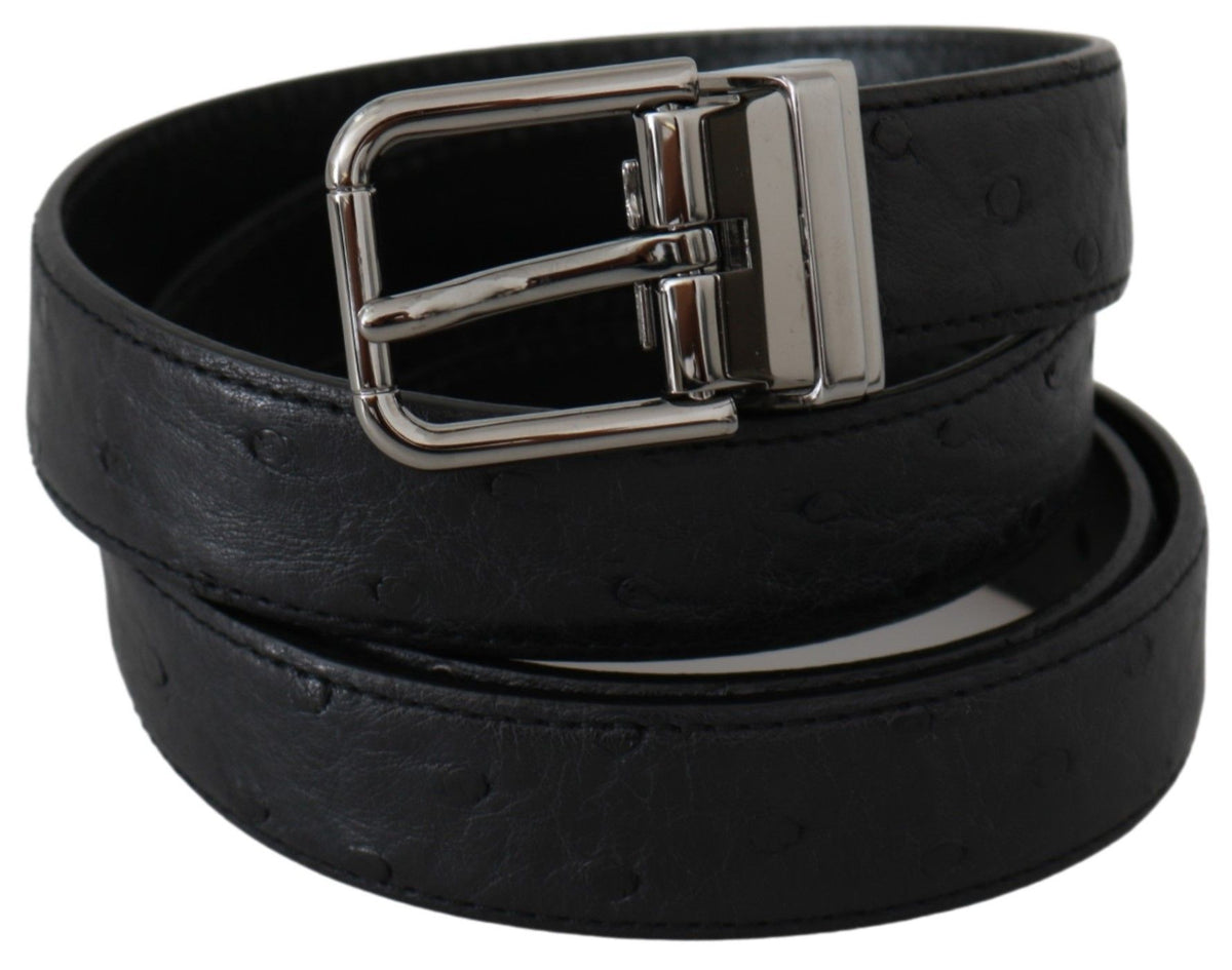 Black exotic skin pattern leather belt with silver buckle from Dolce & Gabbana, showcasing detailed texture and stylish design.