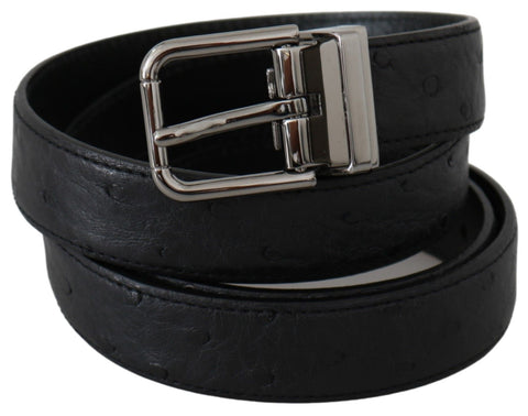 Black exotic skin pattern leather belt with silver buckle from Dolce & Gabbana, showcasing detailed texture and stylish design.