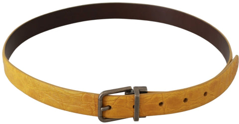 Yellow exotic skin leather belt with grey buckle from Dolce & Gabbana, showcasing textured leather and stylish buckle detail.