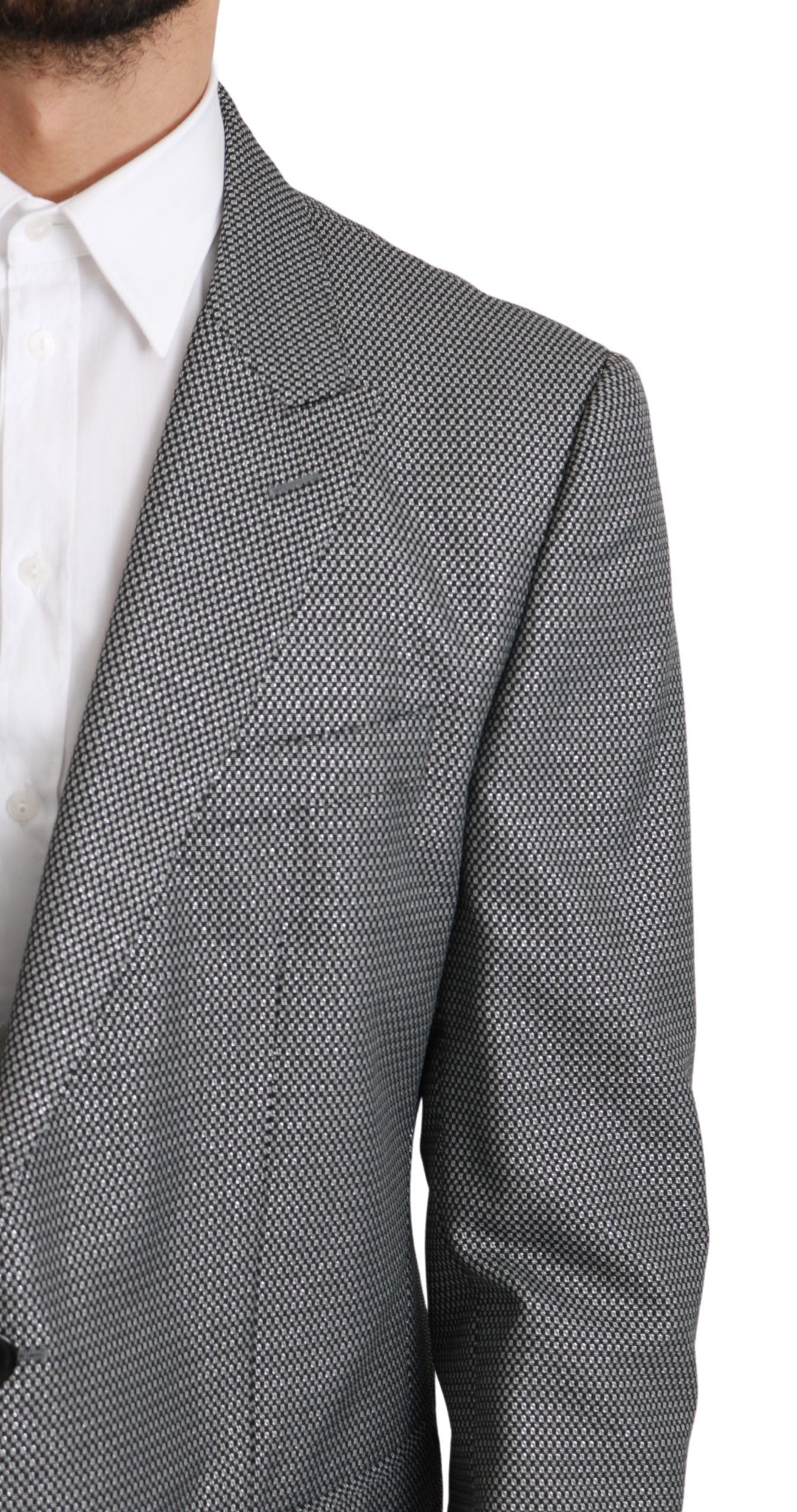 Gray slim fit formal blazer by Dolce & Gabbana, tailored with a sleek design and classic lapel, ideal for sophisticated occasions.