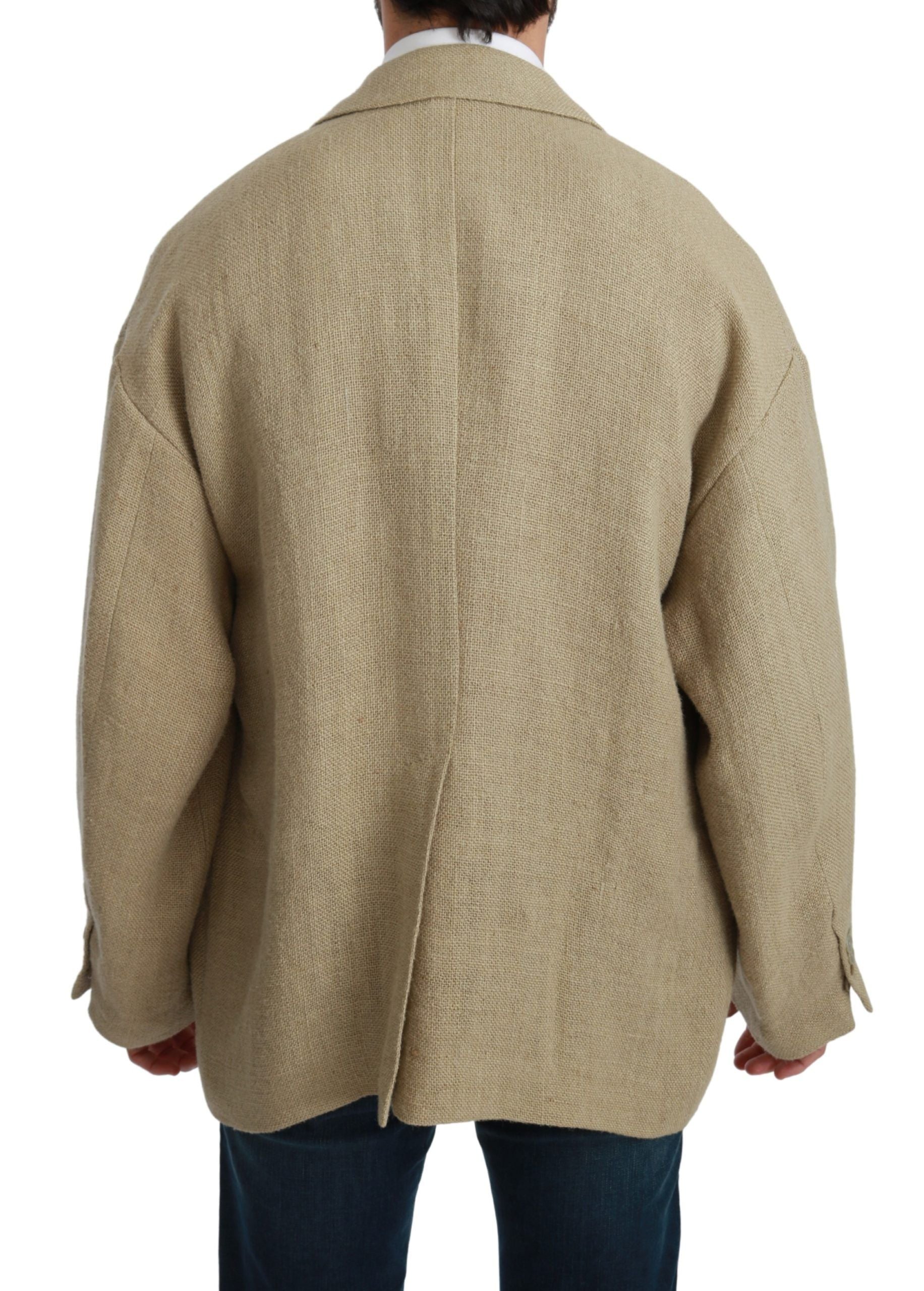 Beige Dolce & Gabbana jute blazer coat displayed on a hanger, showing its tailored fit and textured fabric.