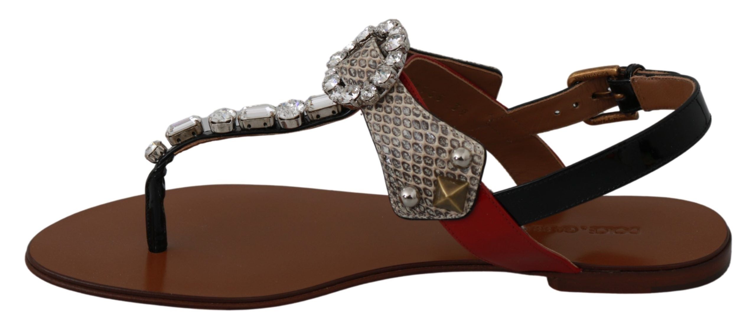 Dolce & Gabbana leather Ayers crystal sandals flip flops with clear straps and decorative crystal accents on a white background.