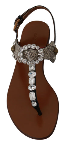 Dolce & Gabbana leather Ayers crystal sandals flip flops with transparent straps and decorative crystal accents.
