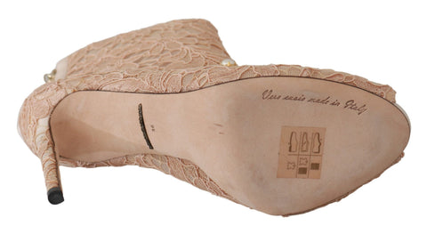 Pink crystal lace Dolce & Gabbana stiletto booties with intricate lace and sparkling crystal embellishments.