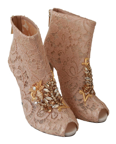 Pink crystal lace Dolce & Gabbana stilettos shoes featuring intricate lace and sparkling crystal embellishments.