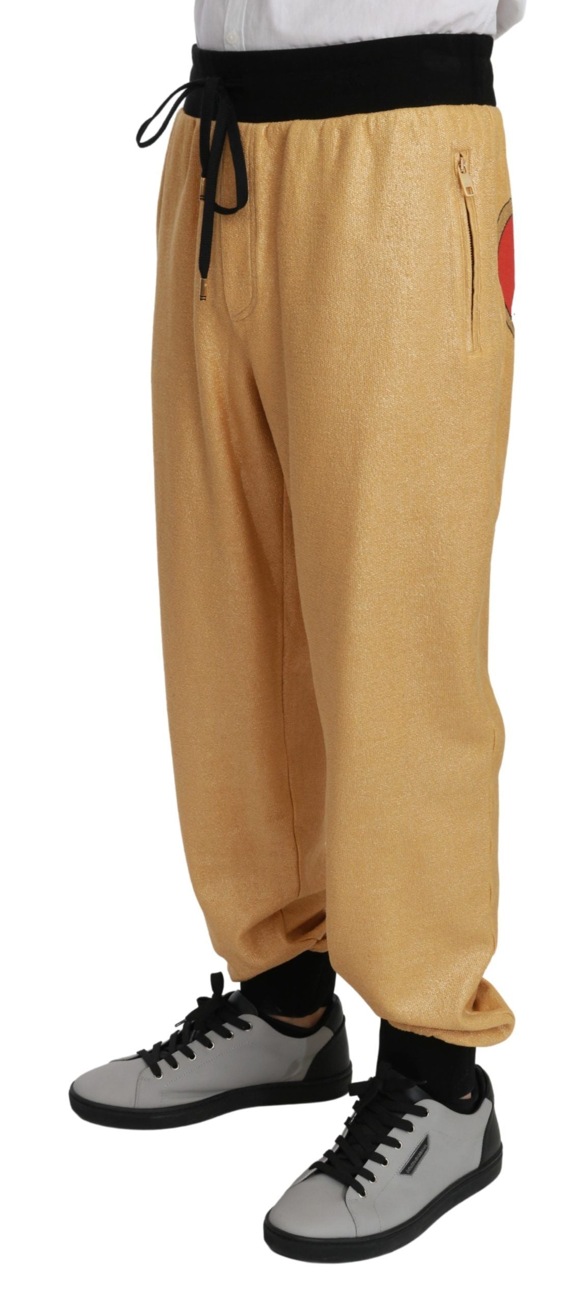 Gold Year of the Pig cotton men's pants by Dolce & Gabbana featuring a detailed pig design and comfortable fit.