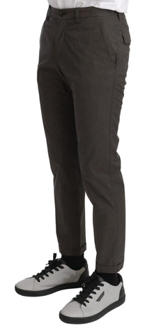 Brown casual men's trousers by Dolce & Gabbana made of 100% cotton, shown laid flat with a focus on the fabric and fit.
