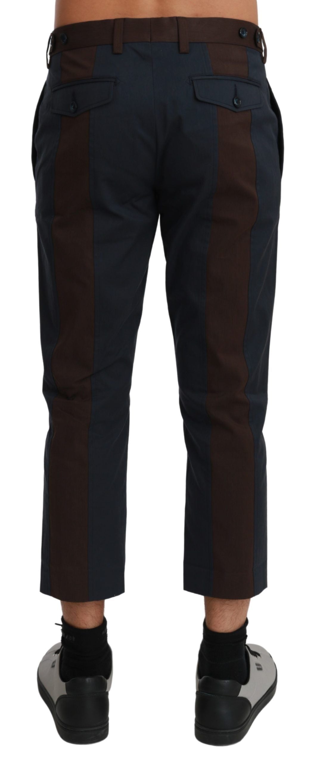 Brown striped cropped trousers by Dolce & Gabbana, featuring a tailored fit and stylish design, shown on a model.