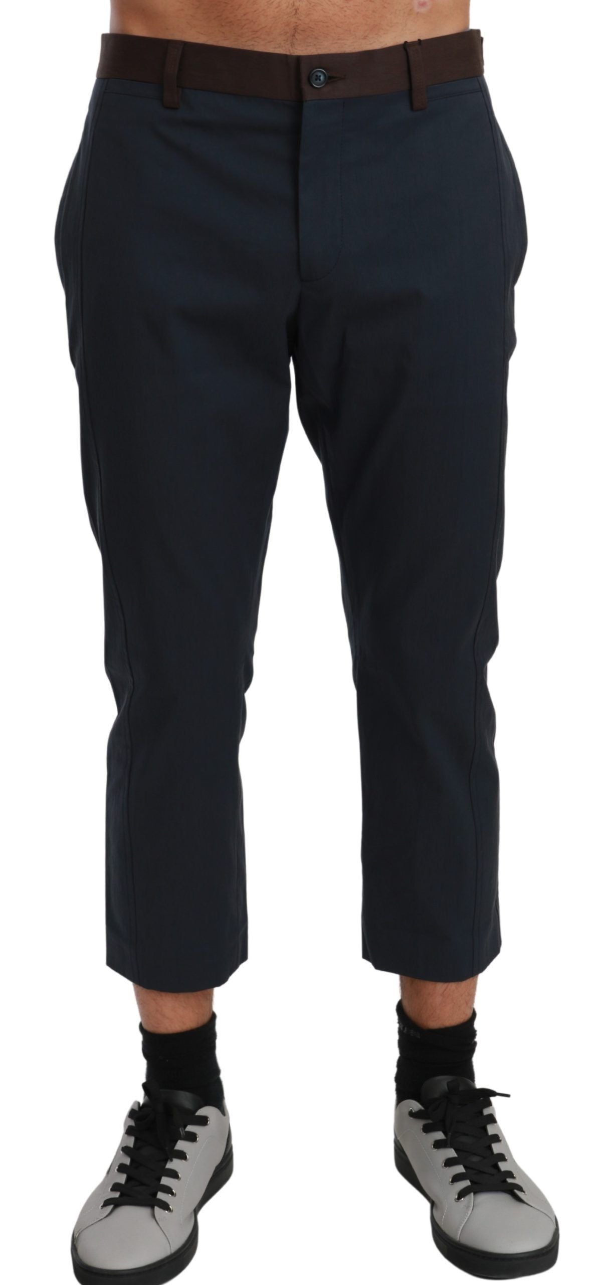 Brown striped cropped trousers by Dolce & Gabbana, featuring a tailored fit and stylish design, shown on a model.
