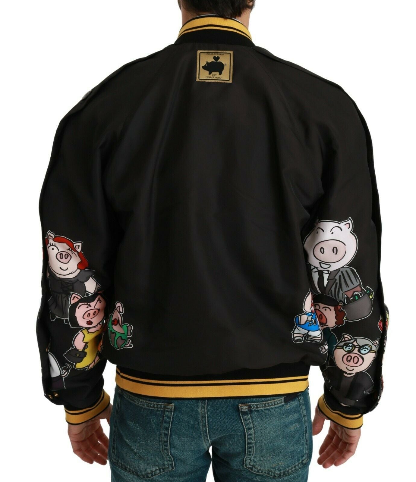 Black Dolce & Gabbana Year of the Pig bomber jacket with embroidery, front zipper, and ribbed cuffs and collar.