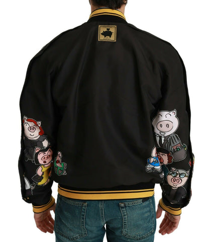Black Dolce & Gabbana Year of the Pig bomber jacket with embroidery, front zipper, and ribbed cuffs and collar.
