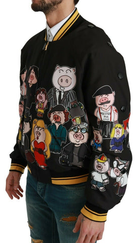 Black Dolce & Gabbana Year of the Pig bomber jacket featuring embroidered pig design and ribbed cuffs, front zipper, and stylish fit.