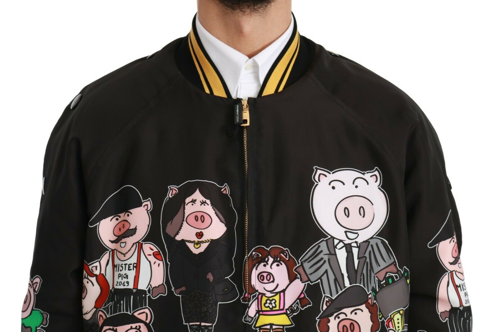 Black Dolce & Gabbana Year of the Pig bomber jacket with embroidered pig design and ribbed cuffs, front zipper closure.
