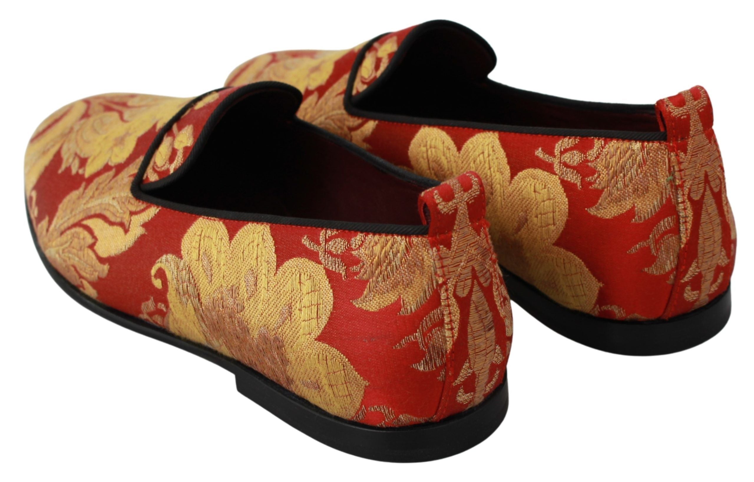 Red gold brocade slippers loafers by Dolce & Gabbana with intricate floral pattern and luxurious fabric.