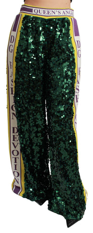 Green sequin trousers by Dolce & Gabbana, Queens Angel Pants, featuring shiny sequin embellishments and a tailored fit.