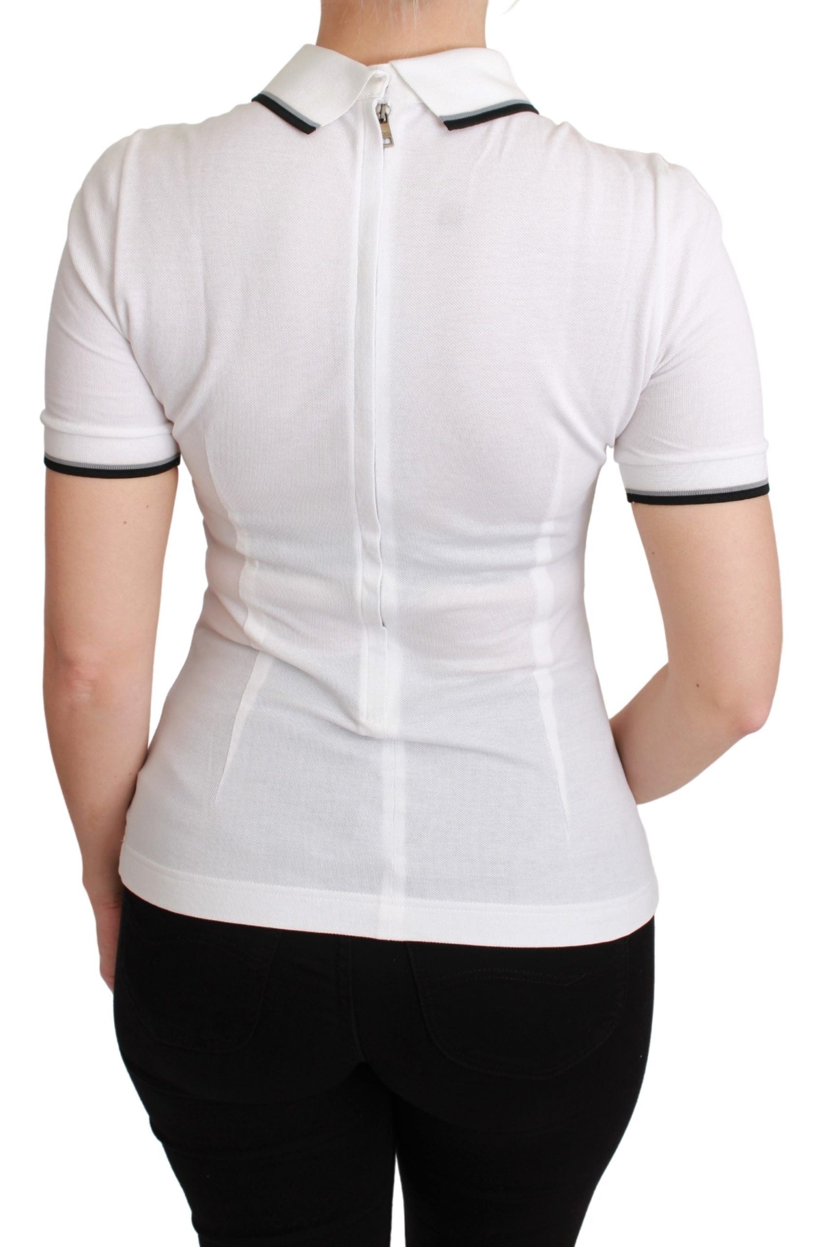 White cotton polo T-shirt by Dolce & Gabbana with a classic collar and short sleeves, displayed flat on a white background.