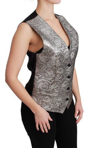 Silver brocade sleeveless metallic top by Dolce & Gabbana, featuring intricate fabric details and a stylish sleeveless design.