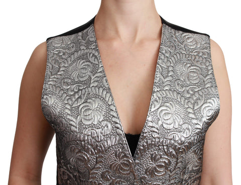 Silver brocade sleeveless metallic top by Dolce & Gabbana, showcasing luxurious fabric and stylish design.