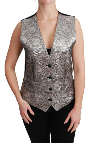 Silver brocade sleeveless metallic top by Dolce & Gabbana, showcasing intricate fabric details and a stylish sleeveless design.