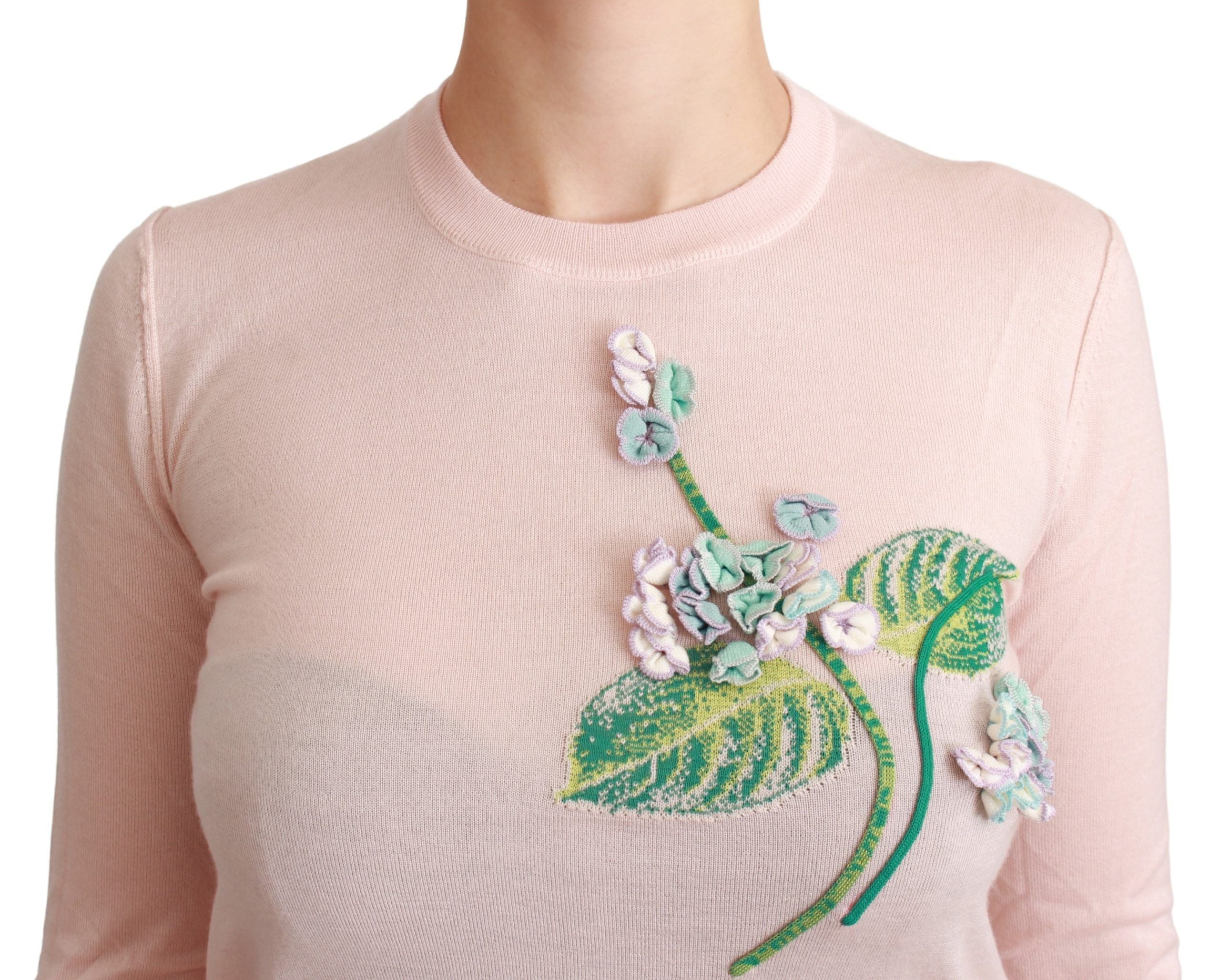 Pink floral silk cashmere pullover sweater by Dolce & Gabbana, featuring a soft silk blend fabric with floral pattern details.