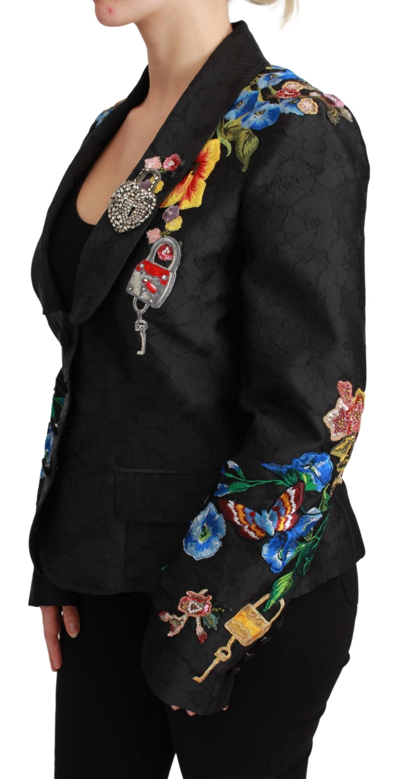 Black brocade crystal blazer jacket by Dolce & Gabbana, featuring intricate pattern and sparkling embellishments.