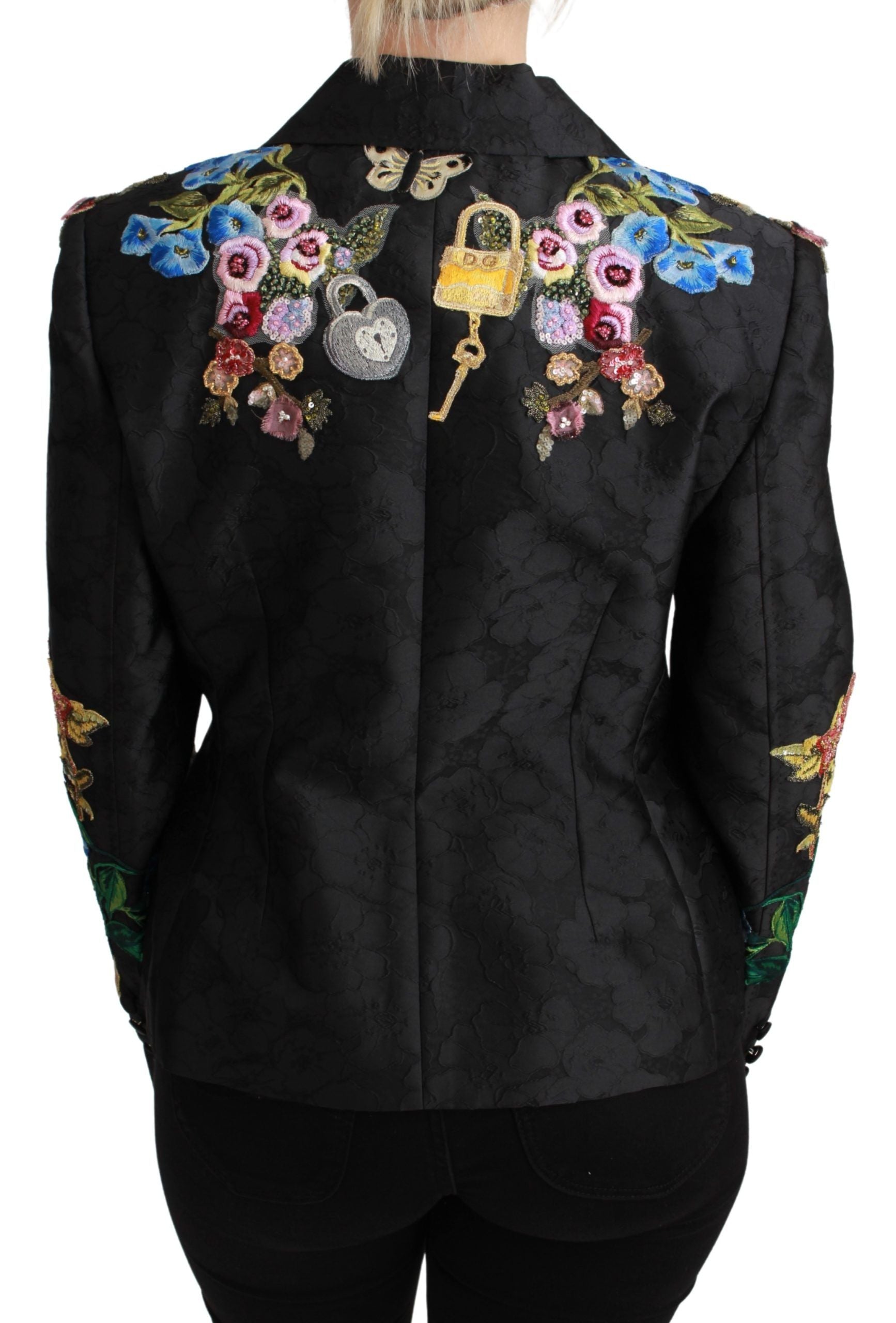 Black brocade blazer jacket with crystal embellishments by Dolce & Gabbana, featuring a tailored fit and ornate design.