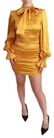 Yellow silk stretch sheath bodycon mini dress by Dolce & Gabbana, showcasing a fitted silhouette and elegant design.