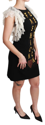 Black Dolce & Gabbana devotion sheath mini dress with fitted silhouette and stylish V-neck, shown on a model.