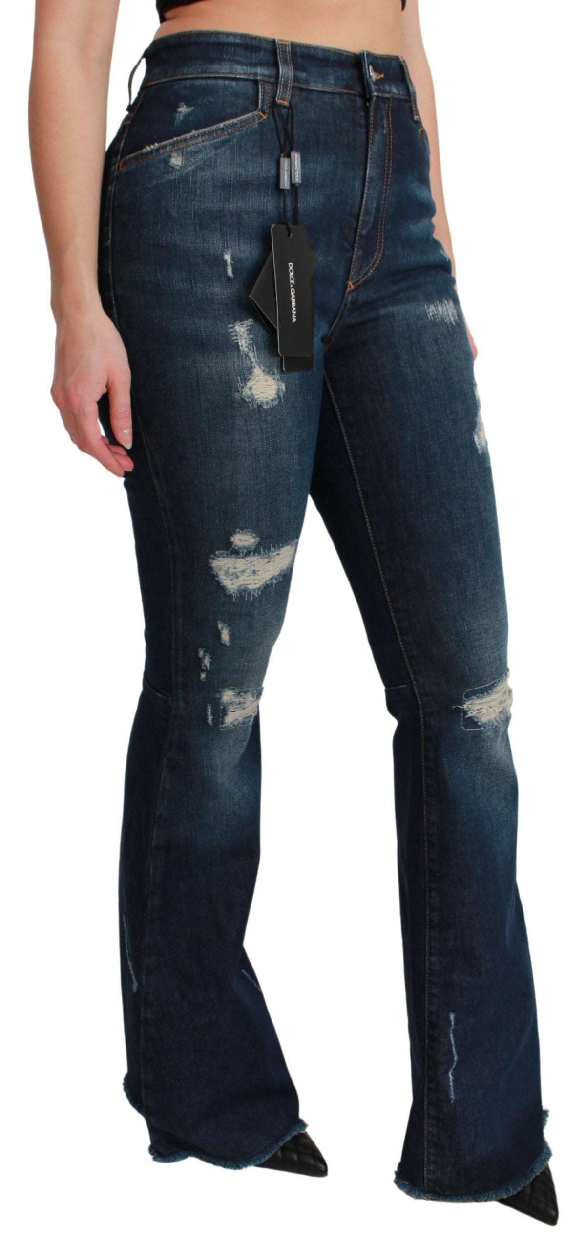 Blue denim cotton stretch flared jeans by Dolce & Gabbana displayed on a model, showcasing classic five-pocket style and fitted waist.