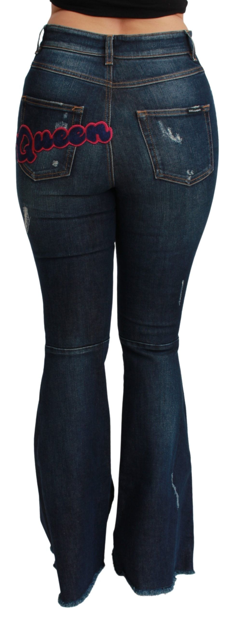 Blue denim cotton stretch flared jeans by Dolce & Gabbana, showing the fitted waist and wide flared legs.