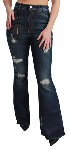 Blue denim cotton stretch flared jeans by Dolce & Gabbana with fitted waist and wide leg opening.