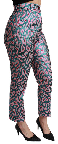 Multicolor patterned cropped high waist pants by Dolce & Gabbana with vibrant geometric design and tailored fit.