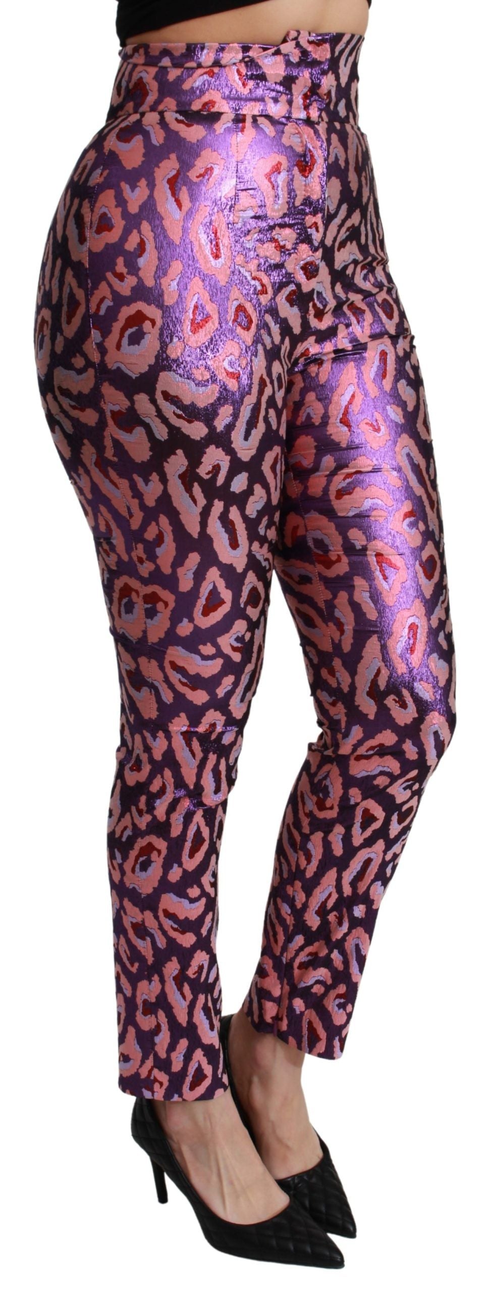Multicolor patterned cropped high waist pants by Dolce & Gabbana, featuring bold prints and tailored fit.