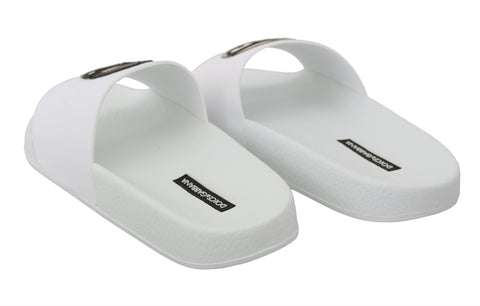 White leather Dolce & Gabbana #dgfamily slides sandals with open toes and wide straps, showcasing stylish casual footwear.