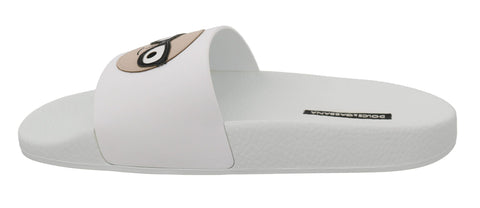 White leather Dolce & Gabbana #dgfamily slides sandals with open toe and slip-on design, stylish and comfortable footwear.