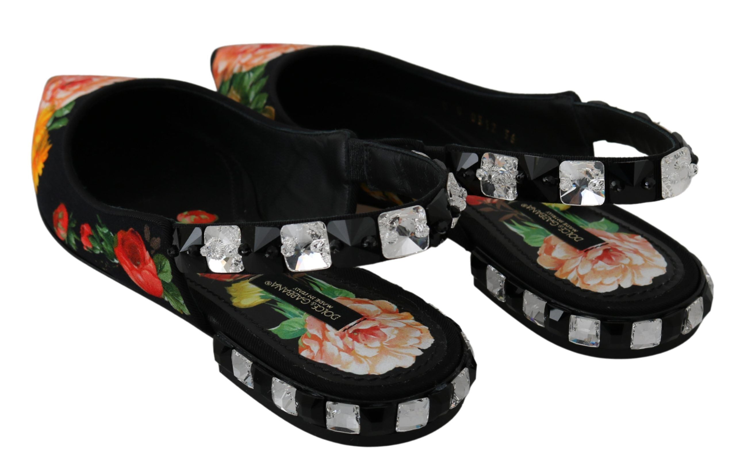 Black floral crystal slingback flats shoes by Dolce & Gabbana with delicate floral embellishments and crystal accents.