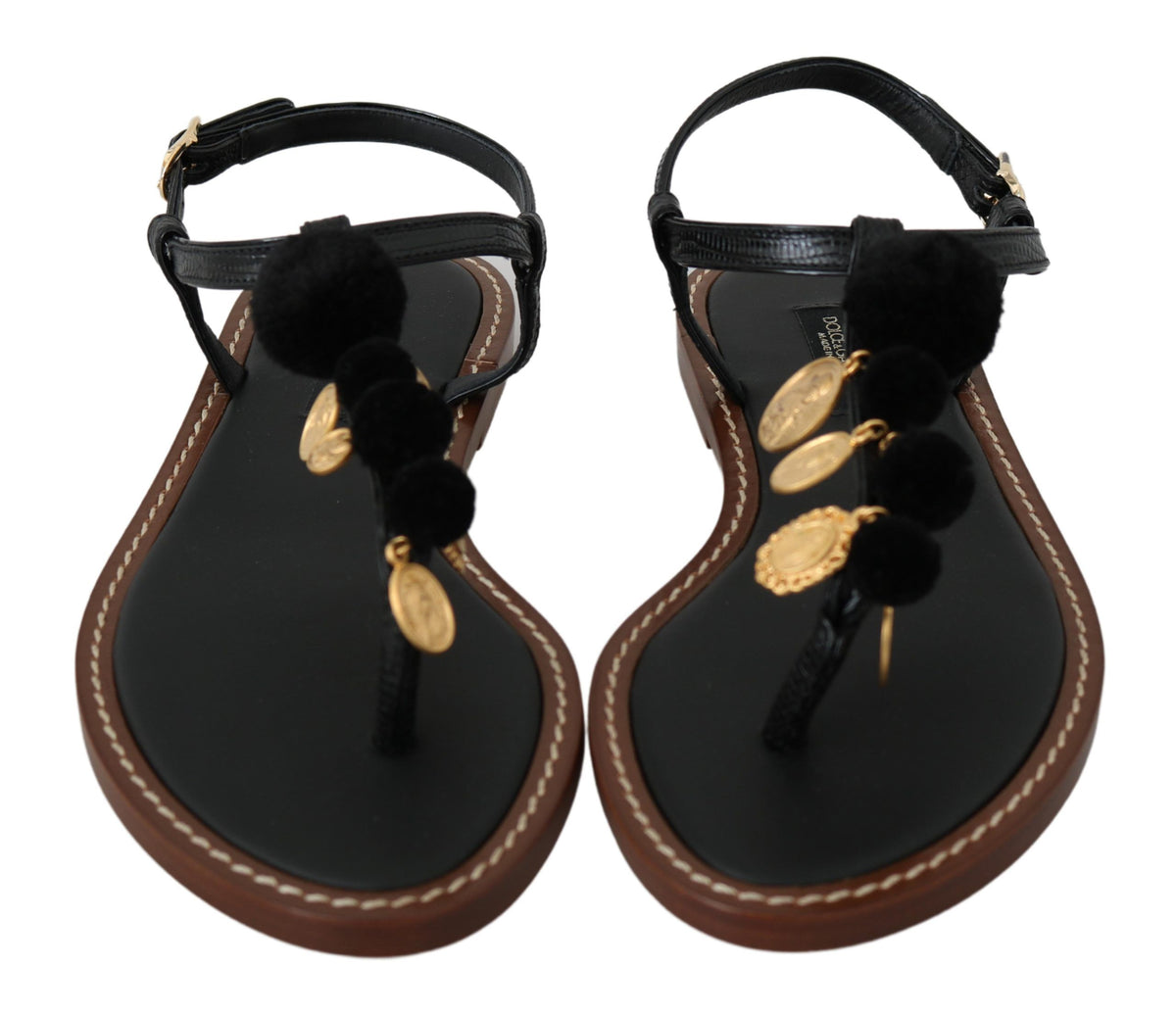 Black leather Dolce & Gabbana coins flip flops with thong straps and flat soles, stylish summer sandals for casual wear.