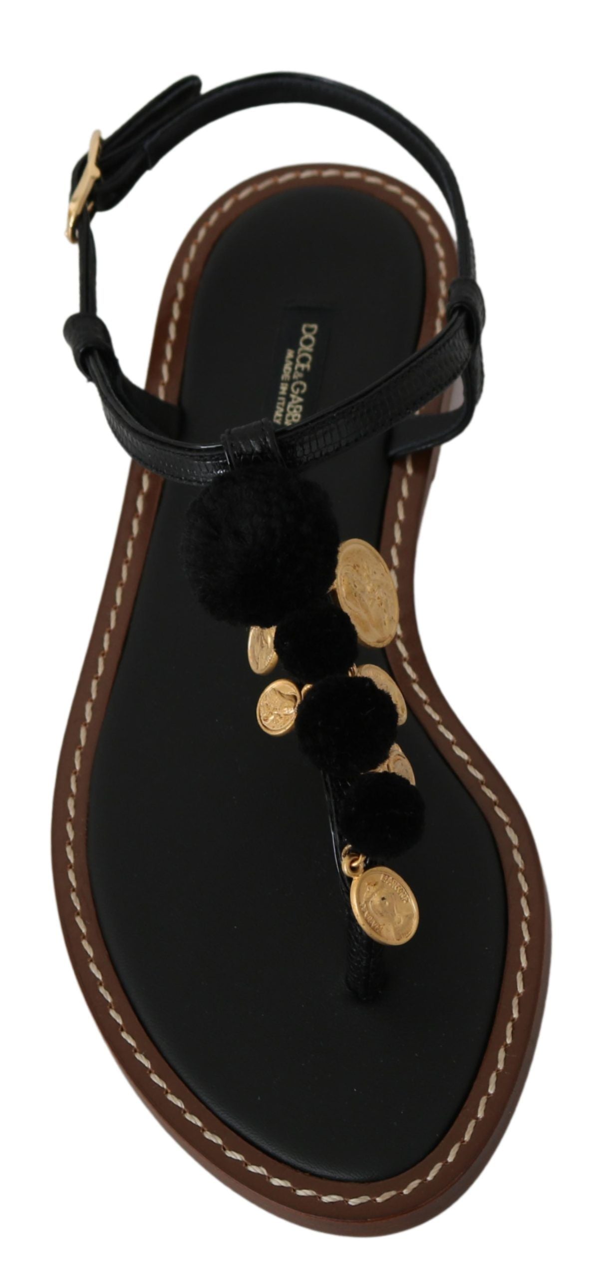 Black leather Dolce & Gabbana coins flip flops sandals with thong design and textured sole, casual summer footwear.
